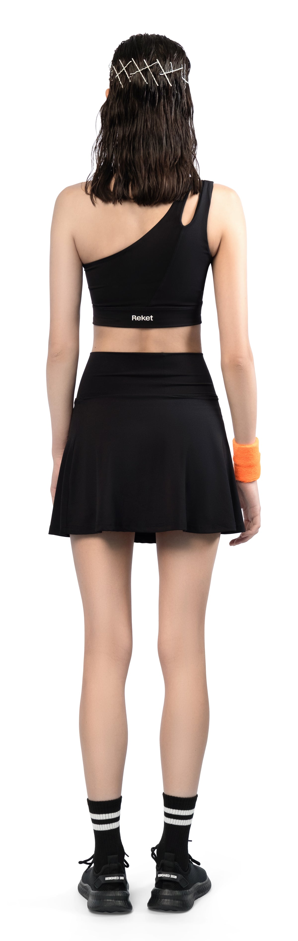 Model wearing Slash Set, back view
